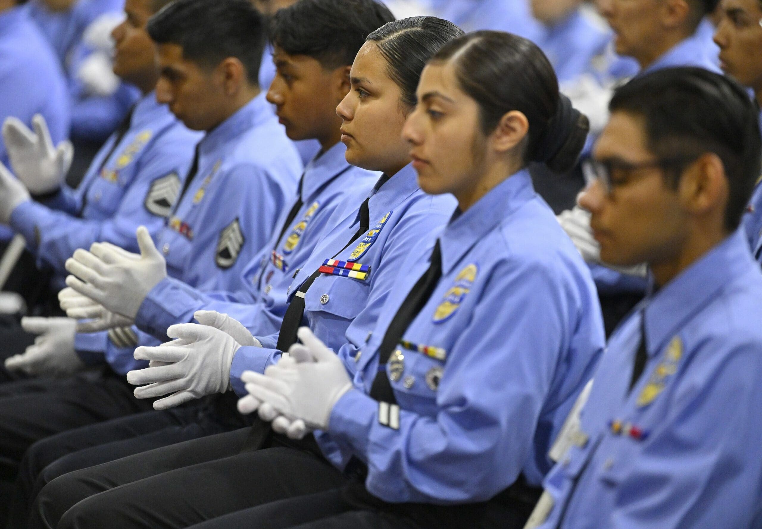 Students Clapping Their Hands at the Graduation Ceremony